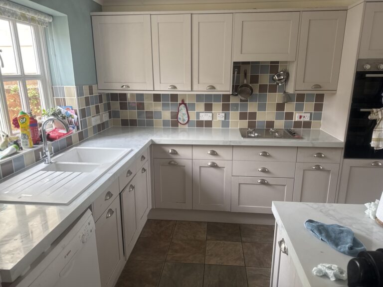 Modern Essex kitchen with Calacatta Canyon quartz overlay worktops after transformation