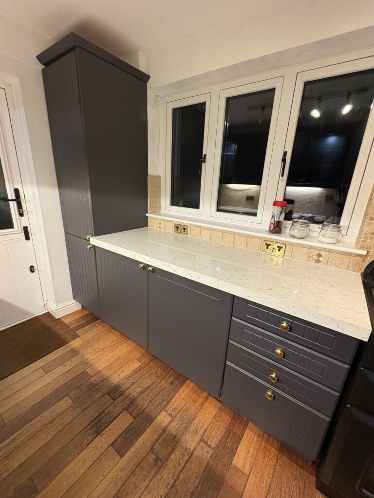 Shutter And Groove doors in Legno Graphite – Carrara Marble quartz overlay – Nottingham