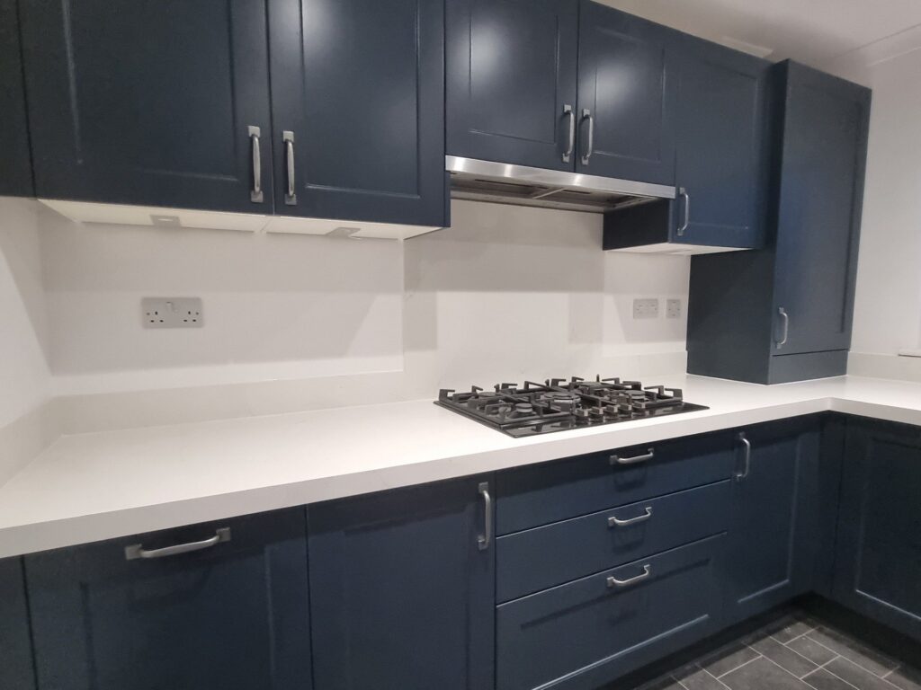 After – Horton doors in Indigo Matt & Alby Blue Matt – Carrara Gold quartz overlay – Folkestone